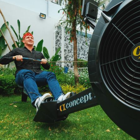 William Sonbuchner on a rowing machine.